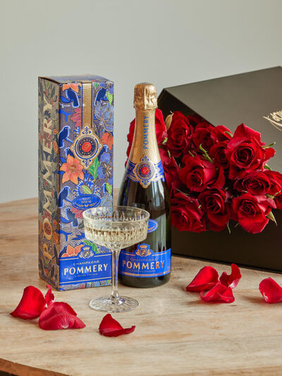 Rosen mit Champagner von Fleurop auf blumen.de