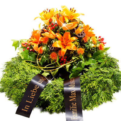 Trauerkranz mit orangen Lilien von FloraPrima auf blumen.de